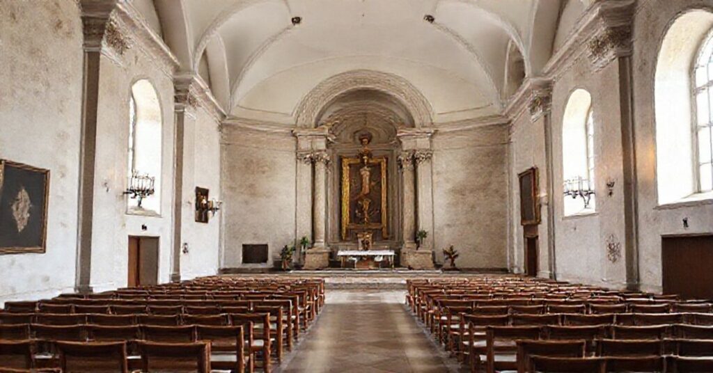 Ciemna sala Auli Pawła VI z o. Roberto Pasolinim i antypapieżem Leonem XIV podczas pseudokatechezy adwentowej.